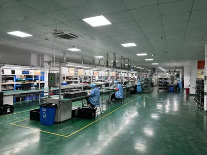 DIP plug-in production line with blue workstations